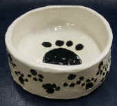 dog bowl paw prints amber.jpg (136182 bytes)
